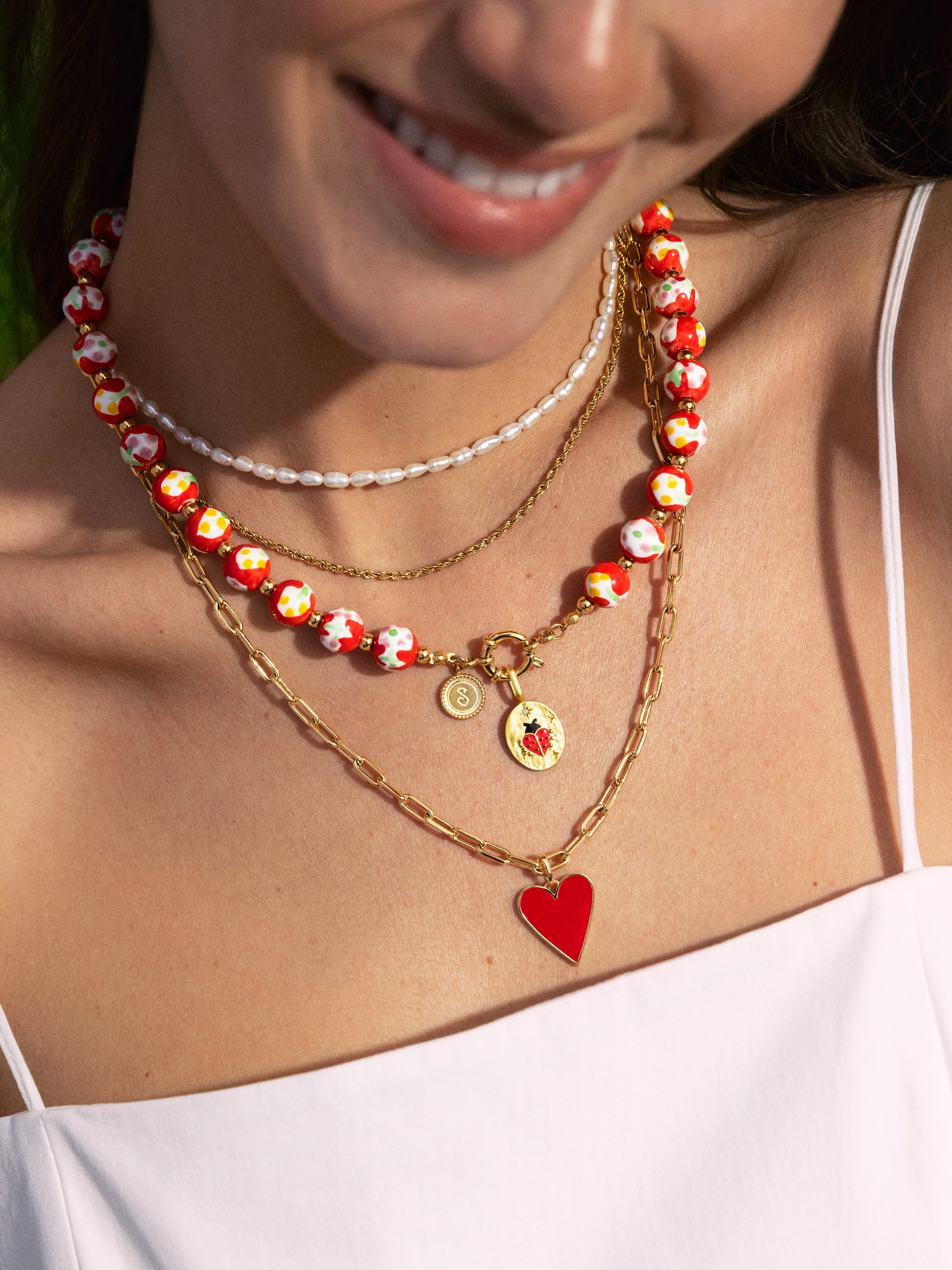 Charm Mariquita Baño Oro