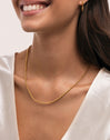 Collier chapelet en acier plaqué or - puesto en modelo